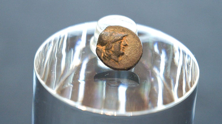 Teen stumbles on mysterious coin from legendary city, puzzling archaeologists over its journey Accountant Find
